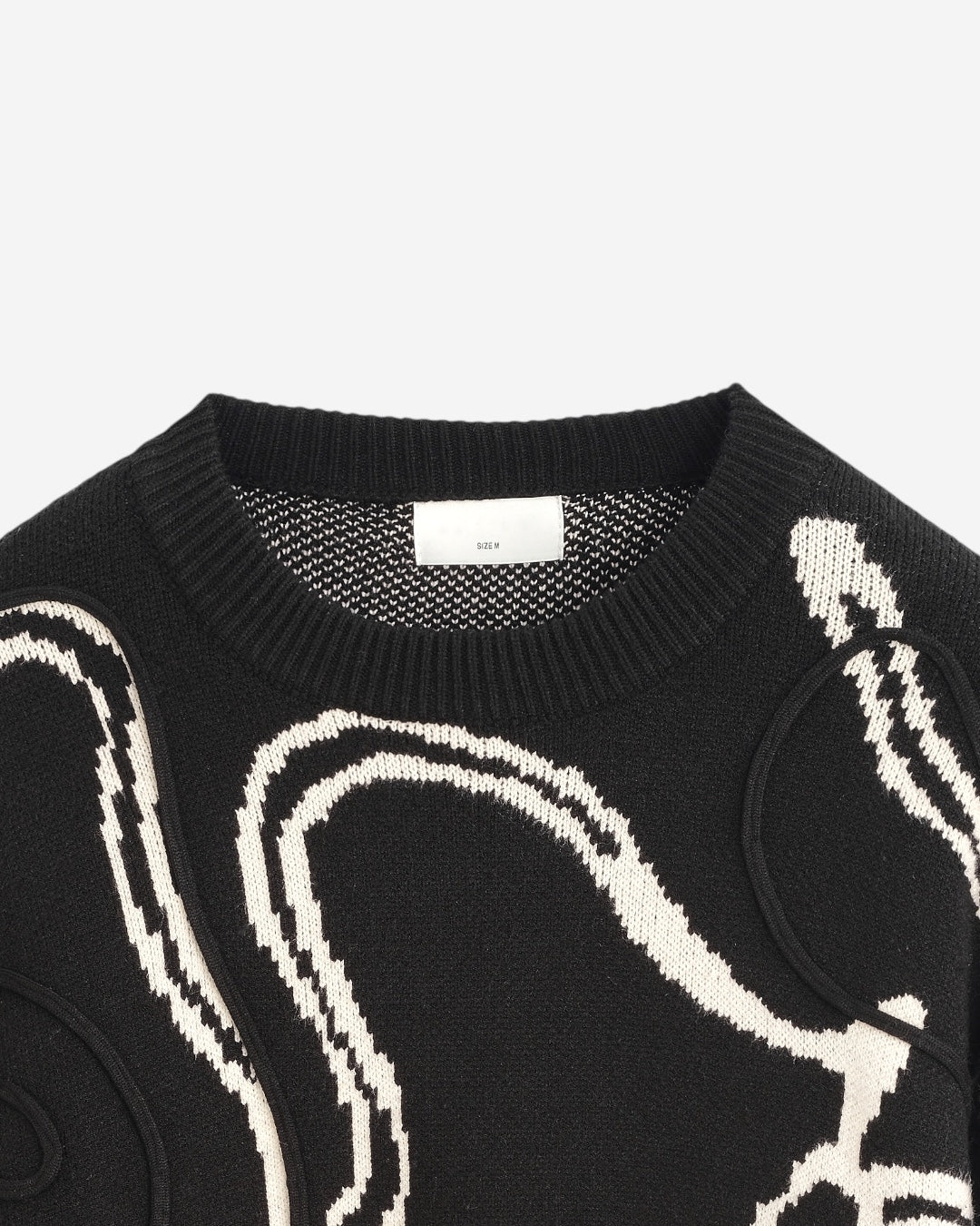 MAGLIONE OVER PATTERN GRAFICO